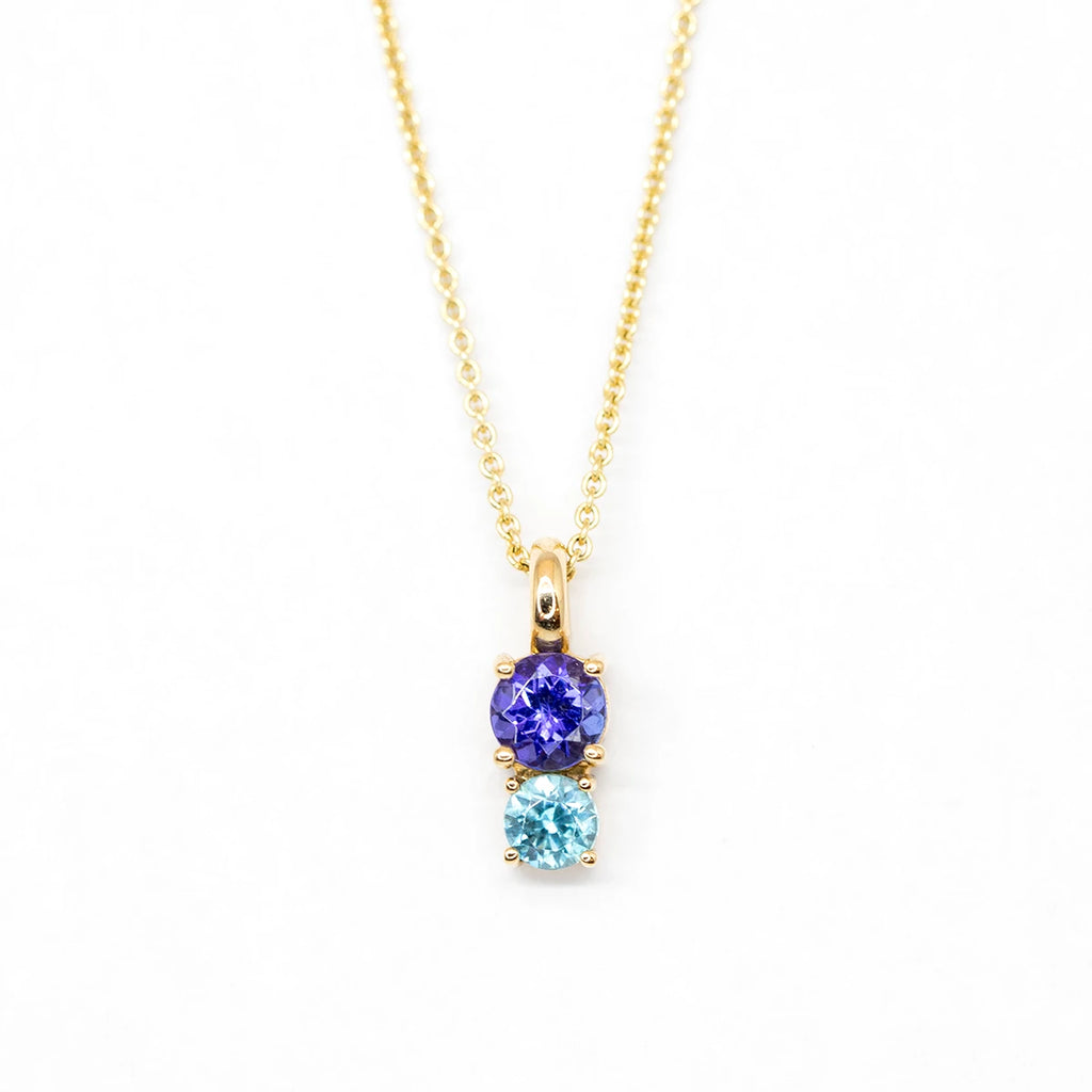 tanzanite and natural blue zircon gemstone pendant made by lico jewelry designer in montreal for boutique ruby mardi best jewellry store in canadian designers on white background