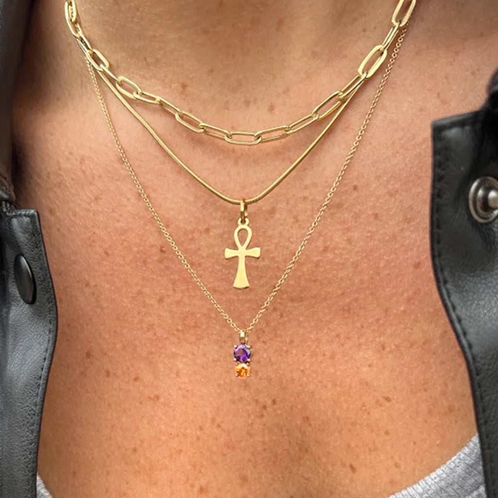 girl wearing yellow gold amethyst and citrine toi et moi pendant with a gold chain made in montreal by lico jewelry designer at boutique ruby mardi best jewellery store in montreal of canadian designer