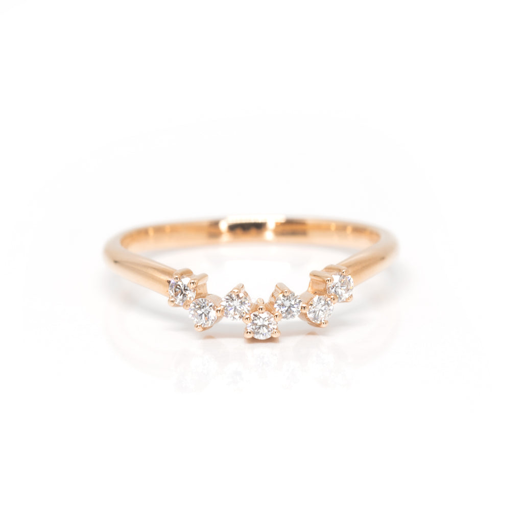Dainty rose gold diamond wedding band photographed on a white background. Handmade in Montreal by jewelry brand Ruby Mardi.