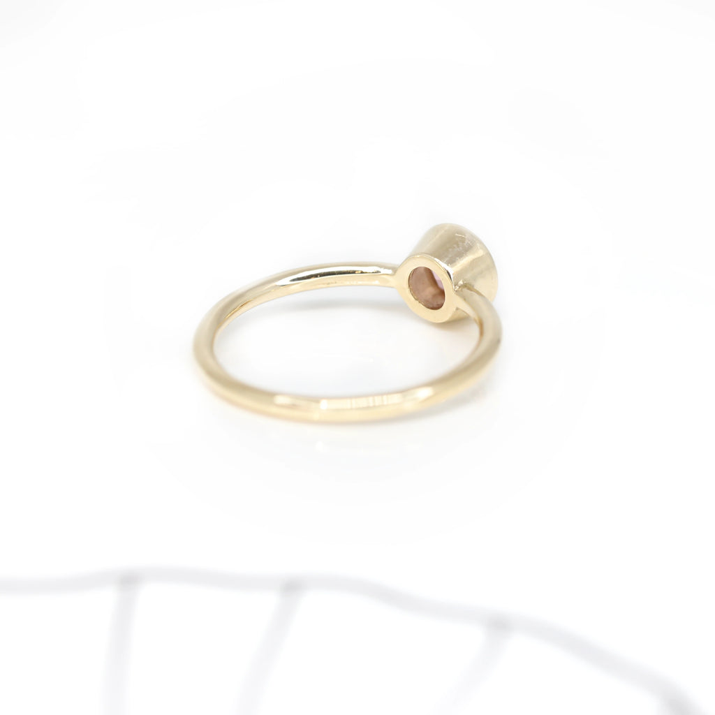 back view of yellow gold minimalist bridal ring made by sheena montreal ruby mardi jewelry designer