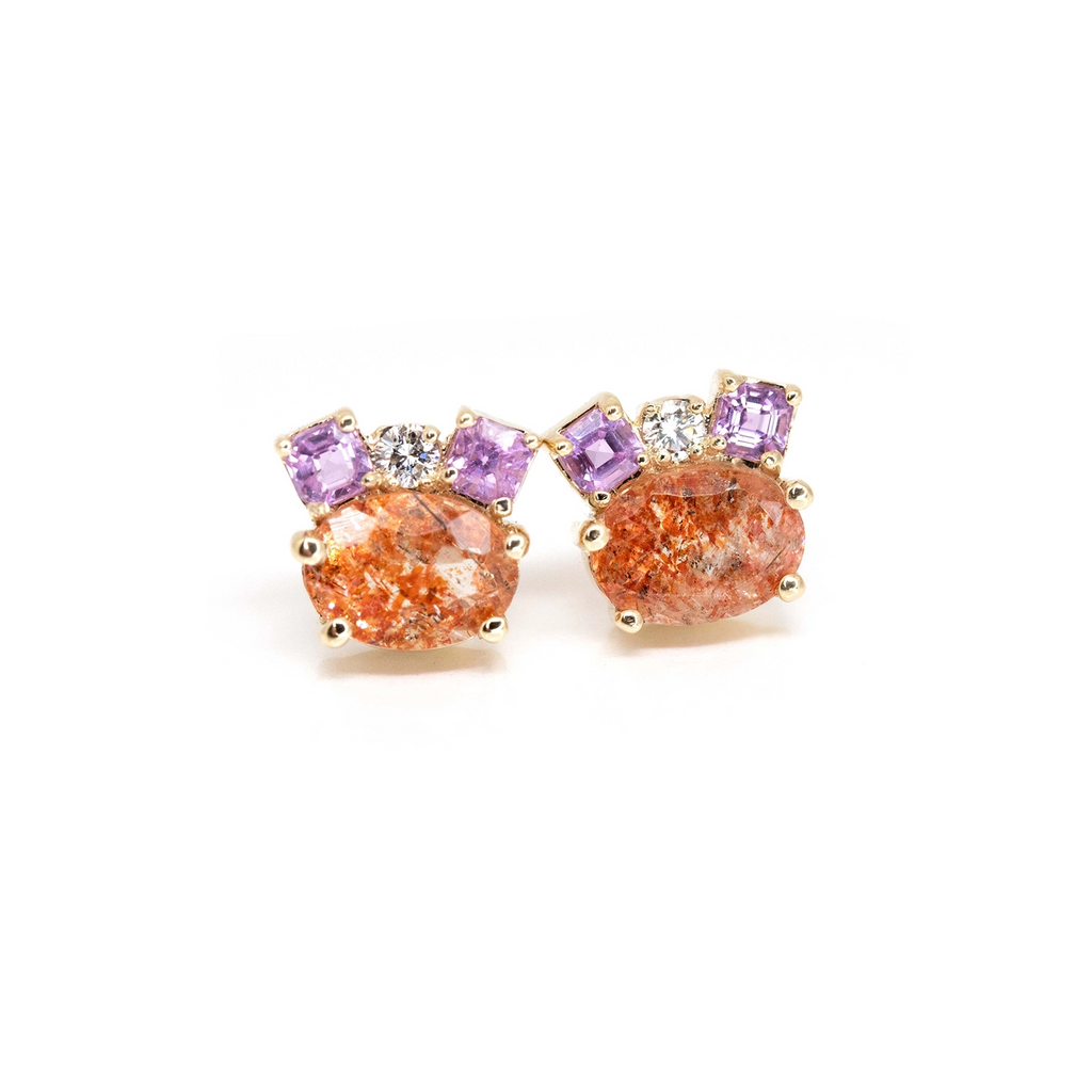 sunstone and purple pink sapphire round diamond yellow gold stud earrings custom made in montreal by bena jewelry for the best jeweler boutique ruby mardi on a white background