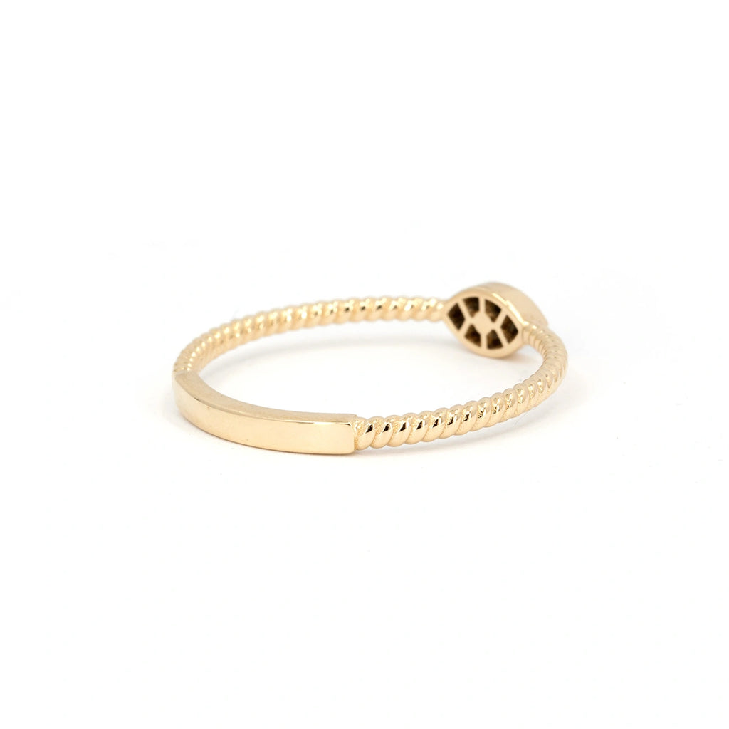 Back view of the Alizé ring in 14k yellow gold by Oleg Leybman, showing the twisted band and open gallery under the marquise-shaped setting. Fine jewelry at Ruby Mardi, Montreal.