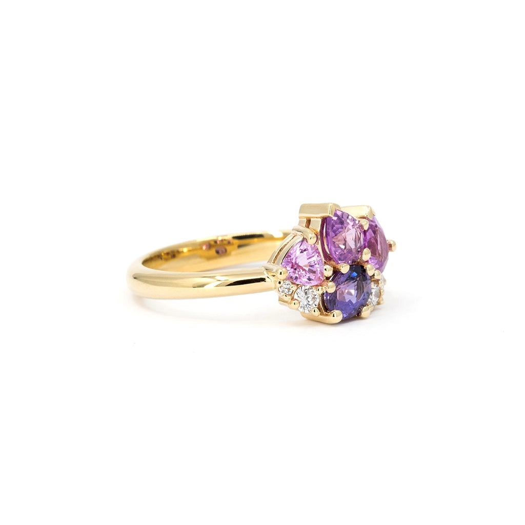 Petal Soufflé sapphire and diamond cluster ring by Ruby Mardi, Montreal, Canada. A unique 14k yellow gold design with four pastel sapphires and five lab-grown diamonds, displayed on a white background for colour accuracy.