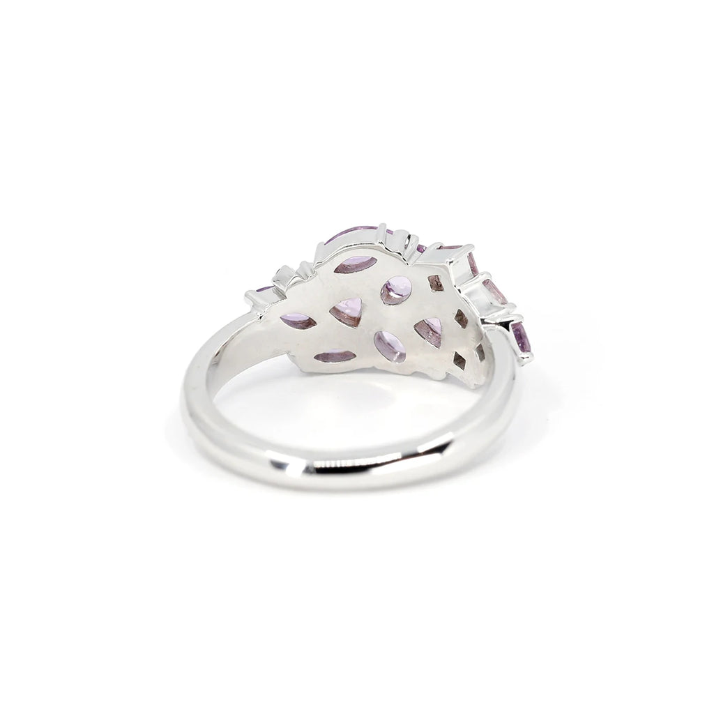 The splendid Berry Mousse ring is handmade in white gold in Montreal by Montreal jewelry artisans. This designer jewel is exclusively available for sale at the Ruby Mardi jewelry store and fine jewelry gallery located in Montreal, in the heart of Little Italy. Made with pink gems, natural sapphires of various shapes.