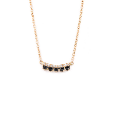 Ruby Mardi necklace in 14k rose gold with black enamel scallop detail and pavé-set natural diamonds. Elegant and timeless designer jewelry by Emily Gill.