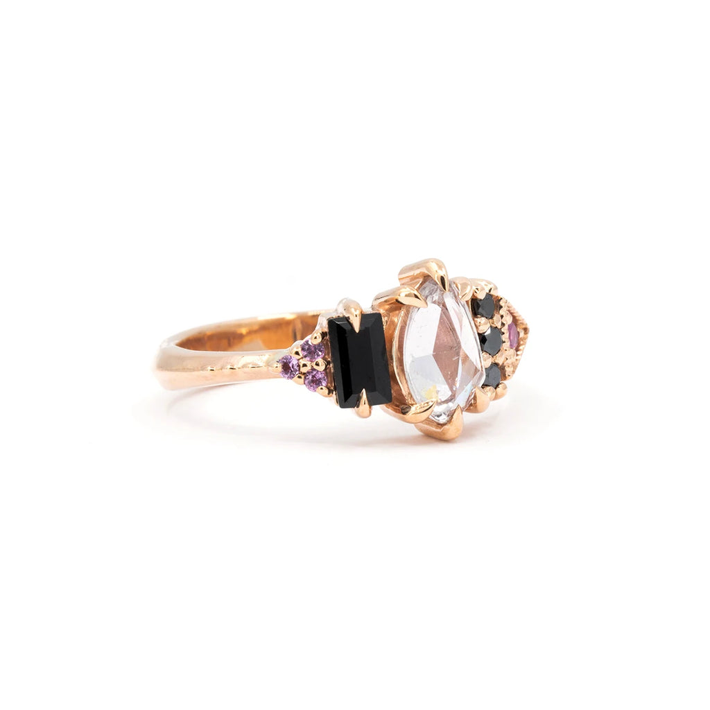 Pink sapphire and black spinel ring in 10k rose gold by Canadian jeweller Nadia Werchola, available at Ruby Mardi in Montreal. A bold, feminine statement ring.