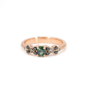 Front view of teal sapphire and diamond ring in rose gold. Bloom Line creation by Ruby Mardi, handcrafted in Montreal.