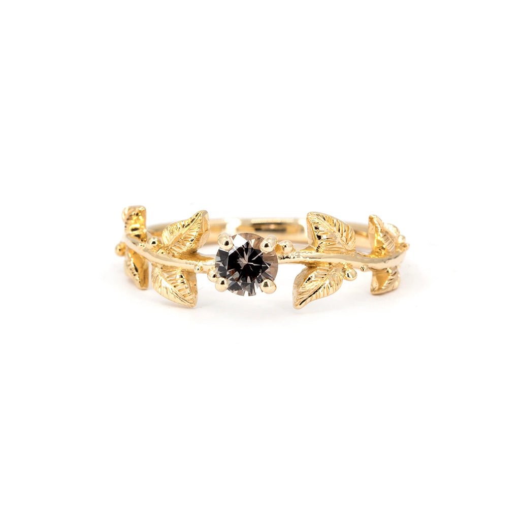 14k gold engagement ring with leaf motif and champagne diamond, nature-inspired design by Meg Lizabet, available at Ruby Mardi in Montreal. Photographed on white background.