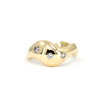 Chunky wavy gold ring with a high-polish finish, featuring three round lab-grown diamonds set into the undulating surface. Handcrafted by Marni Bree, available at Ruby Mardi in Montreal.