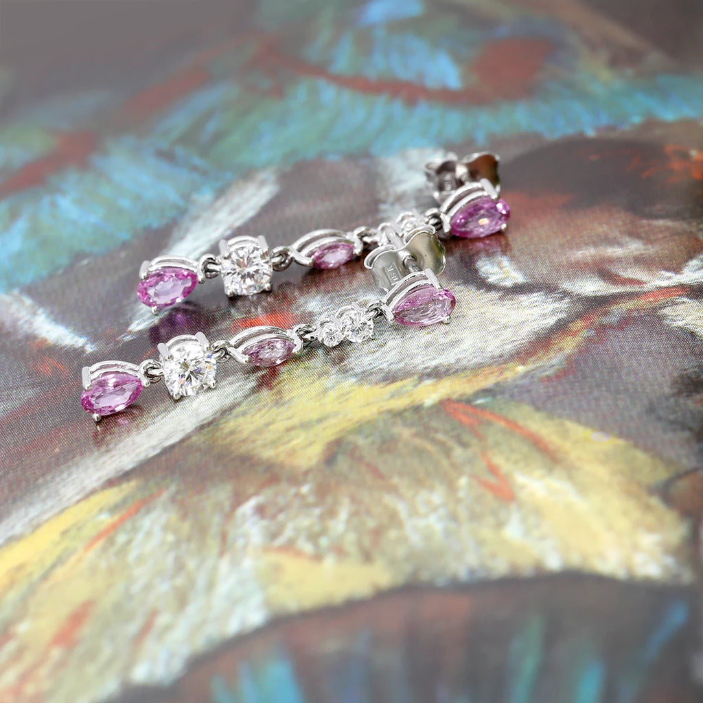 Splendid earrings made with natural pink sapphires, round diamonds and mounted on white gold. This fine high jewelry jewelry is made by VCL jewelry artisans based in Montreal and in collaboration with the Ruby Mardi jewelry store, specialist in fine Canadian and independent designer jewelry.