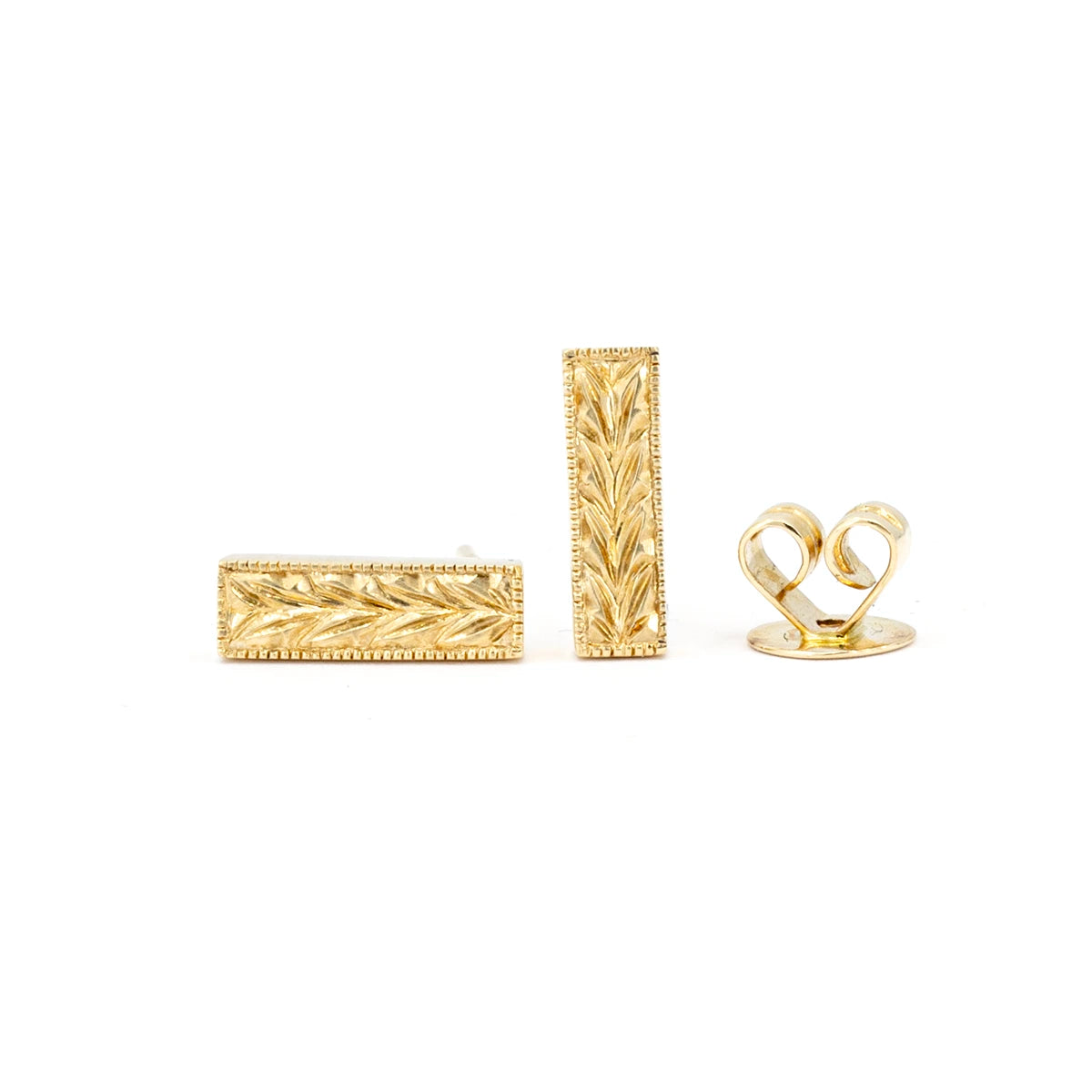 Gold bar earrings with hand-engraved details, designed by Deborah Lavery. These rectangular earrings feature intricate scrollwork, combining elegance and craftsmanship in a unique design. Photographed on a white background to highlight their refined beauty.
