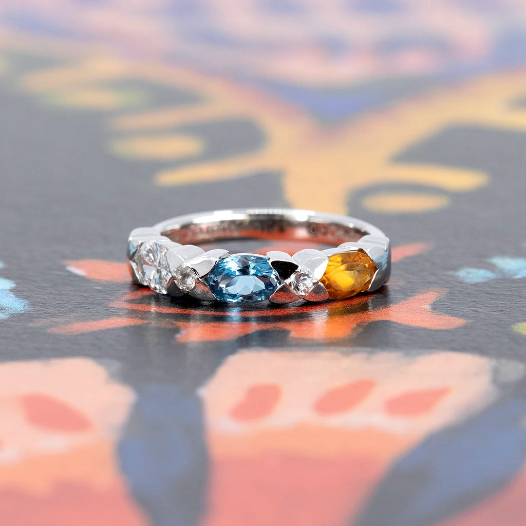 White gold gemstone ring with citrine, London blue topaz, lab-grown diamonds, and colorless sapphires, handcrafted by Fleurs Sauvages QC and offered at Ruby Mardi.
