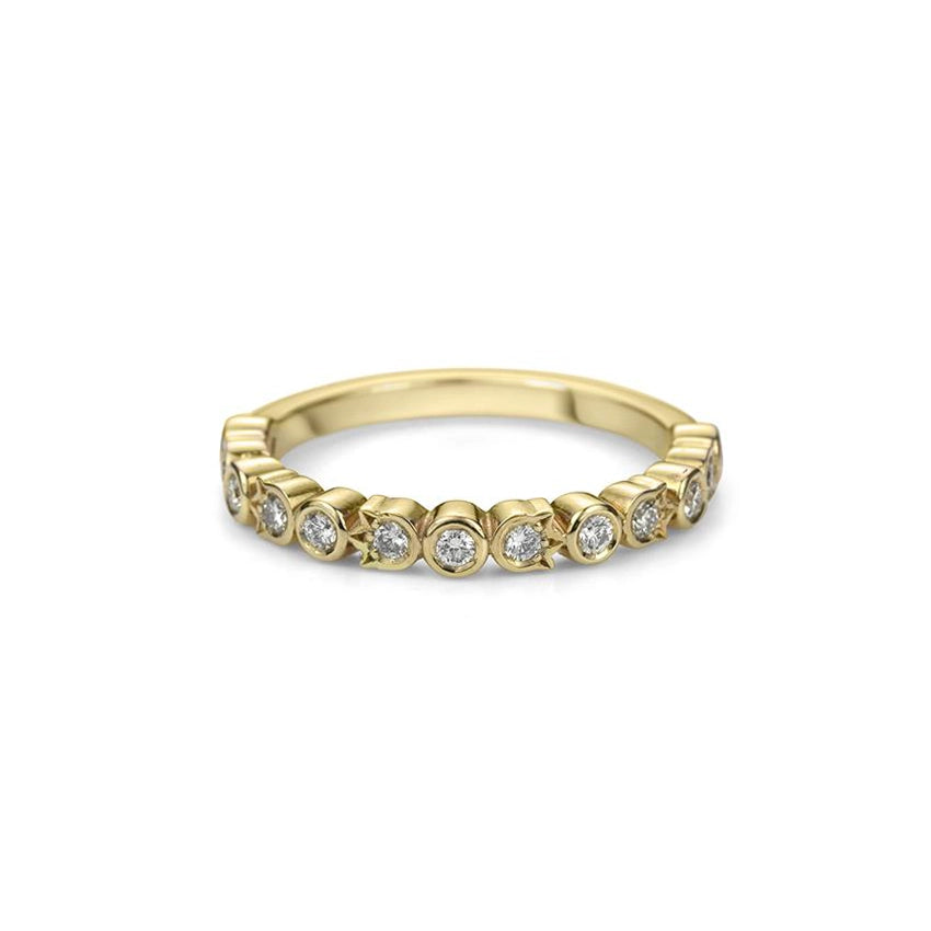 Jewelry designer Bramston Goldsmithing presents the half eternity ring made in yellow gold with splendid natural diamonds. Handmade in Canada, this original wedding band is available for sale at the Ruby Mardi jewelry store in Montreal, specializing in one-of-a-kind bridal jewelry made by independent and talented jewelry artisans.
