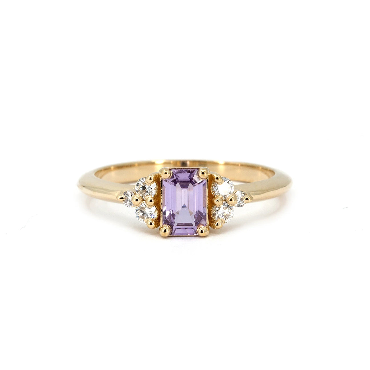 Lavender sapphire engagement ring set in 14k yellow gold, accented by round brilliant diamonds. Designed by Alessandra Pompei, available exclusively at Ruby Mardi.