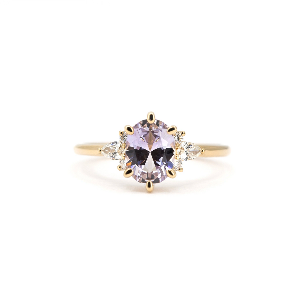 Lilac sapphire engagement ring with marquise and round diamond accents in yellow gold, handmade in Montreal by Maksym Jewelry, available at Ruby Mardi.