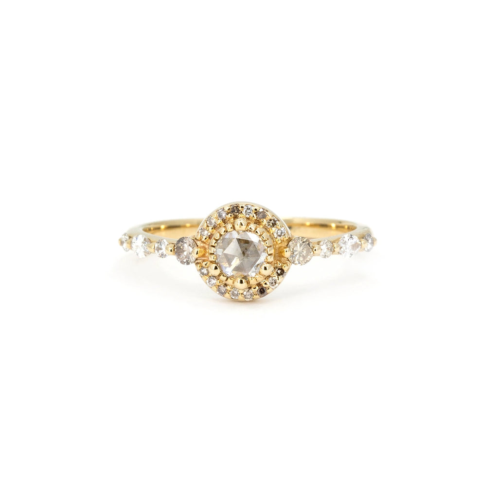 Monarch Ring by Anastassia Sel featuring a rose-cut diamond center, diamond halo and gold granules, photographed on white background – Ruby Mardi, Montreal, Canada.