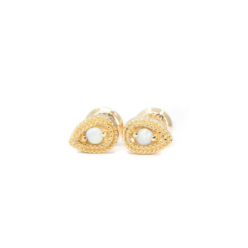 Pair of vintage-inspired gold stud earrings featuring round opals in pear-shaped settings with beaded detailing. Fine jewelry at Ruby Mardi, Montreal.