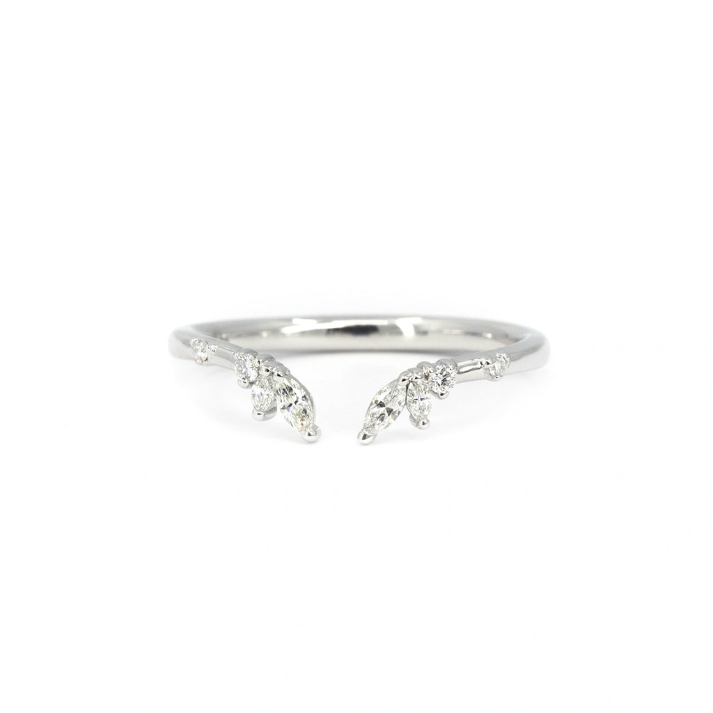 Open white gold wedding band with marquise and round diamonds in a leaf-inspired design, made by Anastassia Sel, available at Ruby Mardi in Montreal.