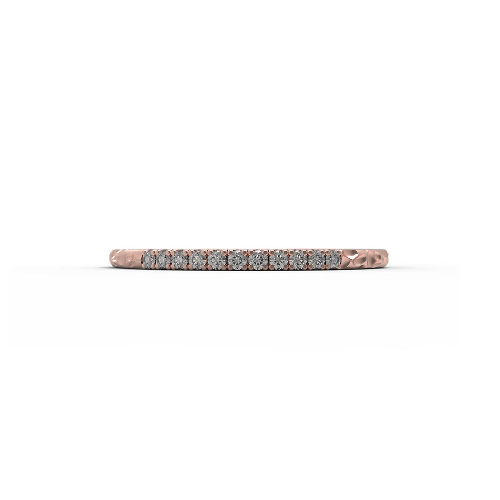 Delicate rose gold diamond wedding band with pavé setting and organic hammered texture, handcrafted by Fluid Jewellery. Available at Ruby Mardi in Montreal.