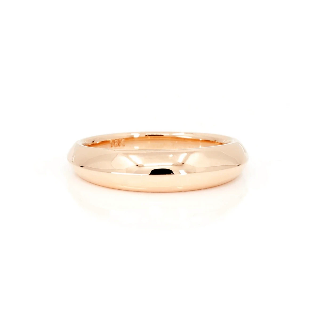 Ruby Mardi jewelry specializes in men's wedding jewelry including yellow gold wedding rings. Made in our studio in Montreal, the fine jewelry is made by experienced jeweler craftsmen. Available for sale we can also create custom jewelry and engagement rings.