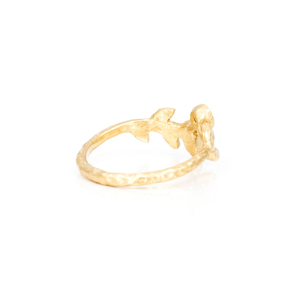 Back view of a textured ring by Anouk Jewelry, resembling a laurel crown, highlighting its organic shape and design, displayed against a plain background.