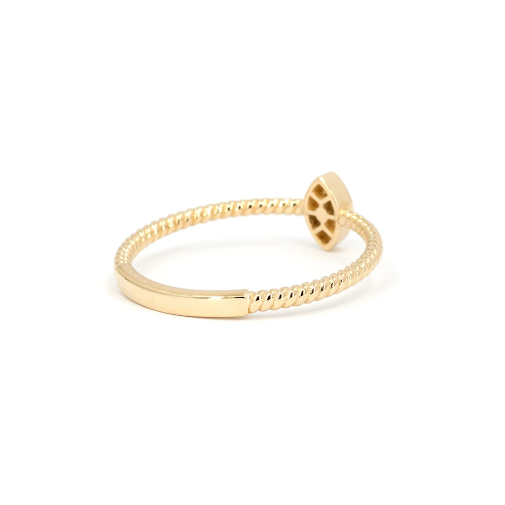 Back view of the Alizé ring by Oleg Leybman, featuring a twisted 14k yellow gold band and marquise-shaped diamond cluster setting. Handcrafted in Toronto, available at Ruby Mardi.