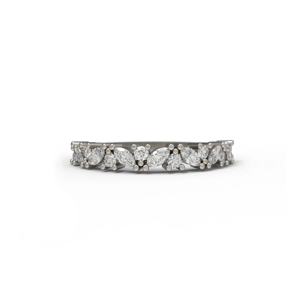 White gold cluster diamond band featuring marquise and round-cut stones, handcrafted by Fluid Jewellery. Available at Ruby Mardi in Montreal.