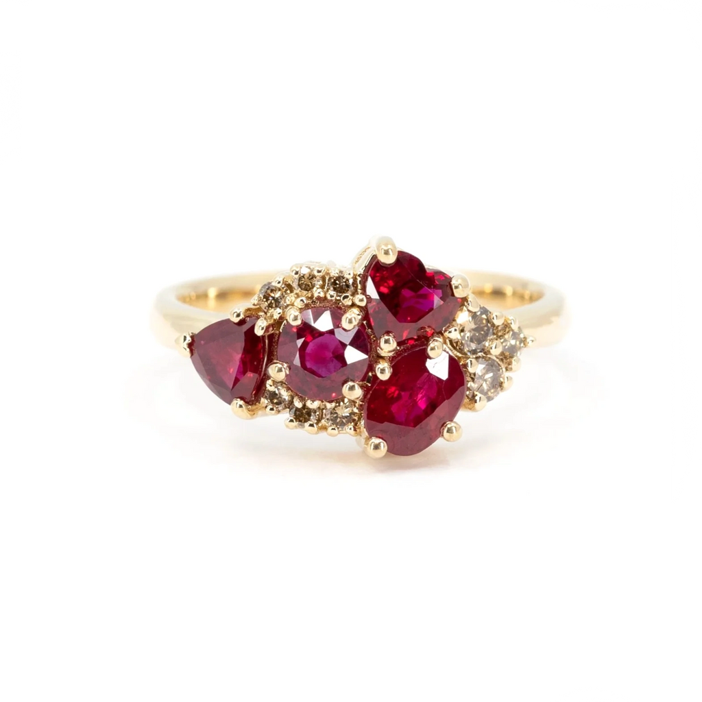 Bold Avalanche ring featuring a cluster of vibrant red rubies and diamonds, set in yellow gold. A bespoke creation by Ruby Mardi in Montreal.
