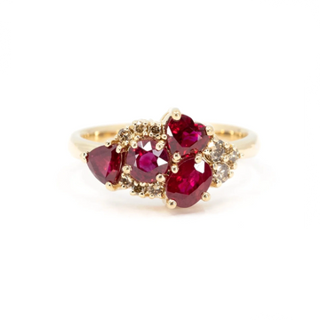 Bold Avalanche ring featuring a cluster of vibrant red rubies and diamonds, set in yellow gold. A bespoke creation by Ruby Mardi in Montreal.