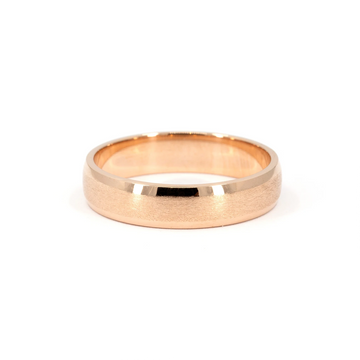 Rose gold wedding band with matte center and polished edges, 5.5mm wide, unisex design by Ruby Mardi Jewelry, handcrafted in Canada.