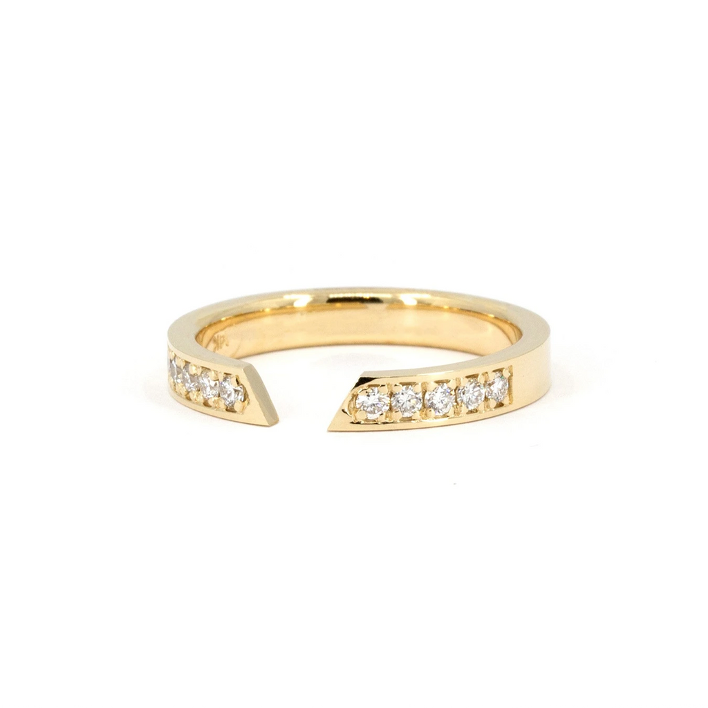 A gold open ring with 10 small diamonds, made to match another ring not pictured (a pentagonal diamond large and chunky gold band). The designer ring is seen photographed on a white background. This modern set of fashion jewellery was designed in Montreal by Bena Jewelry and is available through Ruby Mardi, the coolest Canadian jewelry store.