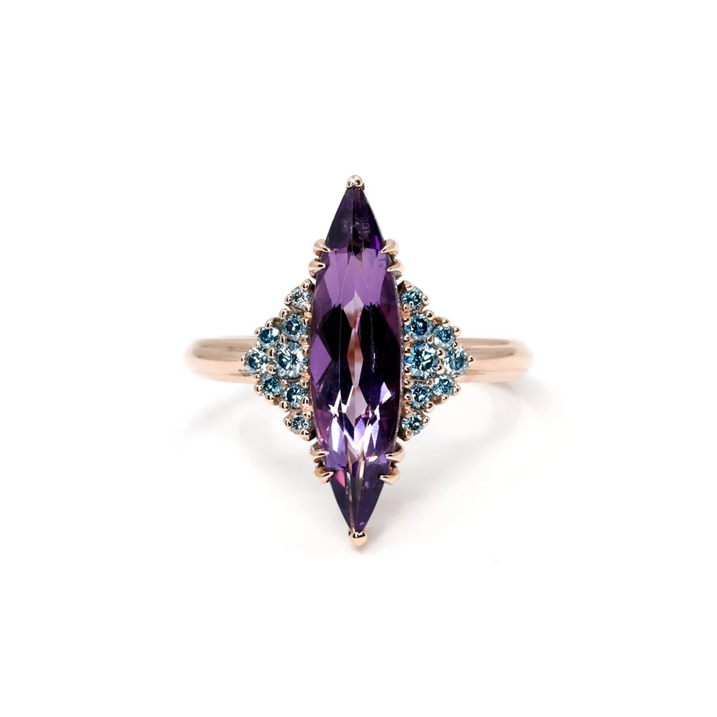 Front view of large marquise-cut amethyst ring with blue diamond accents, in a rose gold setting – Bena Jewelry, edgy statement jewelry from Montreal.