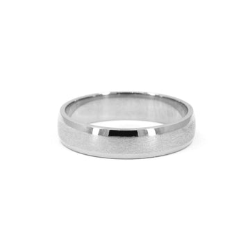 Unisex white gold wedding band with matte center and polished edges, 5.5mm wide, minimalist design by Ruby Mardi Jewelry, handcrafted in Canada