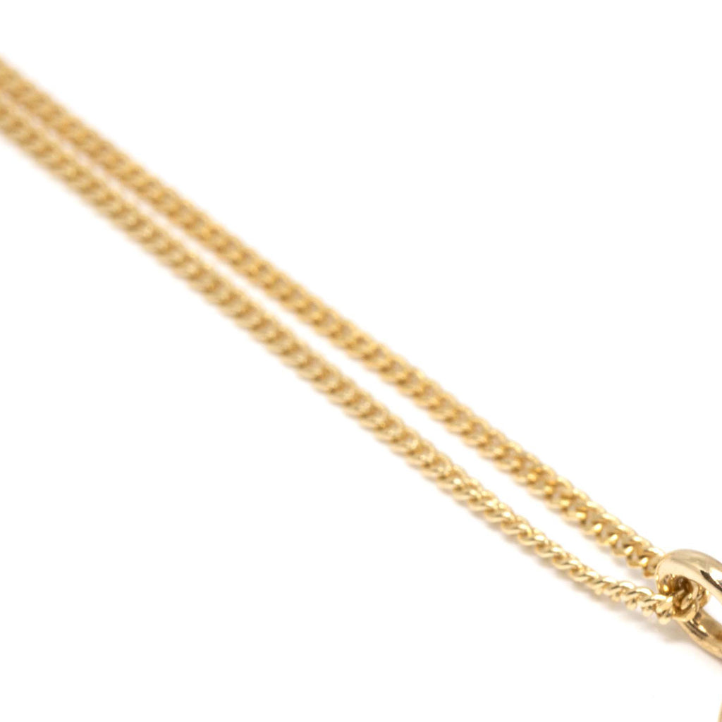 yellow gold chain montreal on a white background