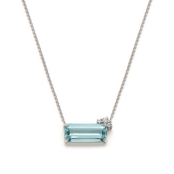 Aquamarine and diamond white gold necklace handmade by Justine Quintal, an independent jewelry designer from montreal. The piece of jewellery is seen on a white background. Thi one-of-a-kind pendant features the march birthstone and is available at fine jewelry store Ruby Mardi.