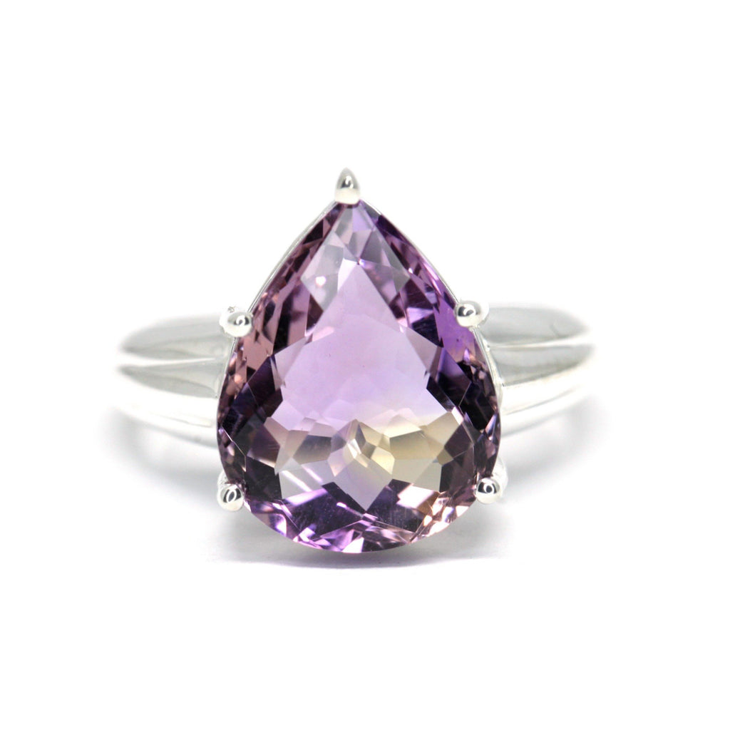 Edgy ring from Canadian jewelry designer Bena Jewelry featuring a big stunning ametrine on a silver band. Find more cocktail rings and statement rings at Ruby Mardi, a fine jewelry gallery in Little Italy Montreal, not far from Outremont, Villeray, Mile End, Mile Ex and Rosemont districts. Engagement rings and Custom jewelry services also offered. 
