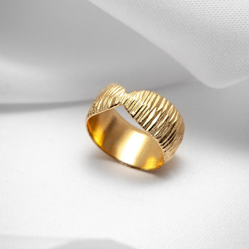 Gold Vermeil large textured ring by Véronique Roy JWLS, available at Ruby Mardi, a concept-store and fine jewelry gallery in Montreal's Little Italy. Ruby Mardi sells the jewelry of talented young Canadian Jewelry designers online and at its physical store. We offer engagement rings, heirloom jewelry, gemstone jewelry, and custom jewelry services in Montreal.