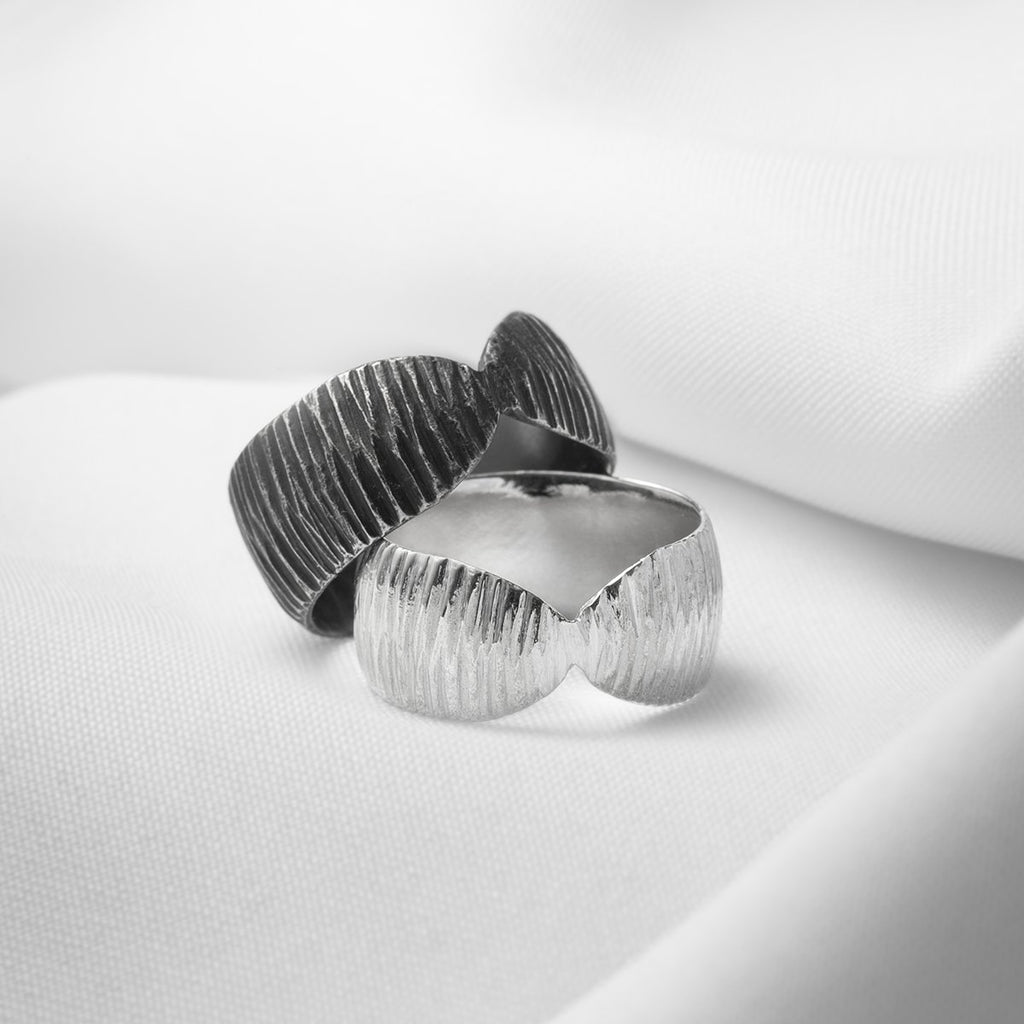Oxidized sterling silver thick and wide designer rings, handmade in Montreal by Véronique Roy JWLS, and available at jewelry store Ruby Mardi, in Montreal's Little Italy.