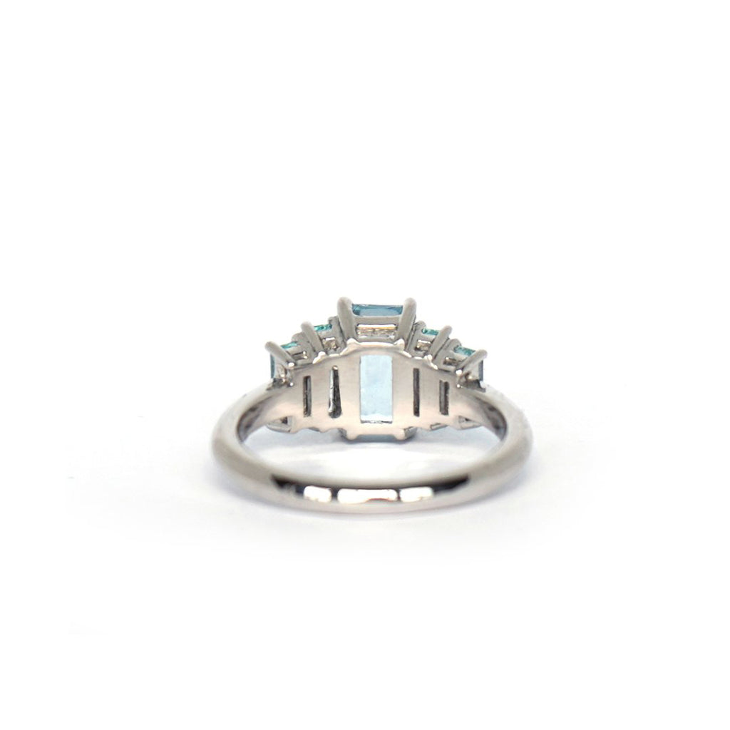 Platinum ring with five aquamarine. Superb jewel inspired by the art deco era from Canadian jewellery designer Lico Jewelry. Find her creations at Ruby Mardi, a fine jewelry gallery located in Montreal's Little Italy, a few steps from Bijouterie Italienne. We specialize in custom jewelry and engagement rings. 