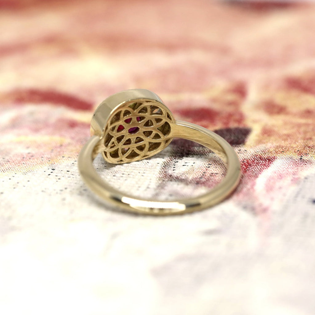 Superb back of a precious gold ring handmade in Montreal. Find more beautiful jewelry at Ruby Mardi, a jewellery gallery showing the work of the best Canadian designers. 