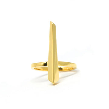 Product photography of Peak ring in gold vermeil by Bena Jewelry on a marble background. Find the most exquisite designer jewelry at Ruby Mardi, a fine jewelry store in Montreal that presents the work of the most talented Canadian jewelry designers. Custom jewelry services also offered.