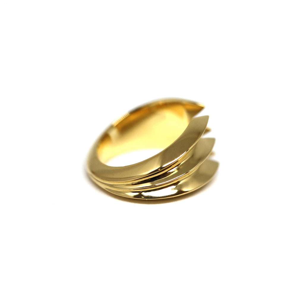 side view of vermeil gold edgy ring custom made montreal fine jewelry unisex bold designer bena jewelry canadian best desgin at boutique ruby mardi on a white background