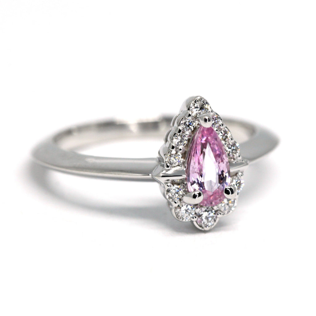 pink sapphire diamond white gold bridal custom made engagement ring made in little italy montreal jeweller ruby mardi jewellery designer on a white background