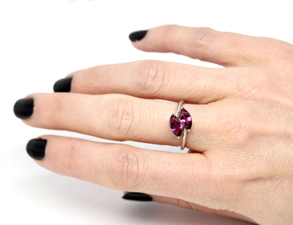 Double Marquise Shape rhodolite garnet Engagement ring worn. Handmade by Ruby Mardi, a fine jewelry gallery in Montreal Little Italy, close by Bijouterie Italienne, and Rosemont, Outremont, Villeray, Parc Extension, Mile End, Mile Ex districts. White gold gemstone ring, bridal jewelry, wedding ring, ethical gem. Ruby Mardi offers custom jewelry services in Montreal. Lab grown diamonds, natural diamonds, Canadian diamonds, ethical diamonds, ethical gemstones.