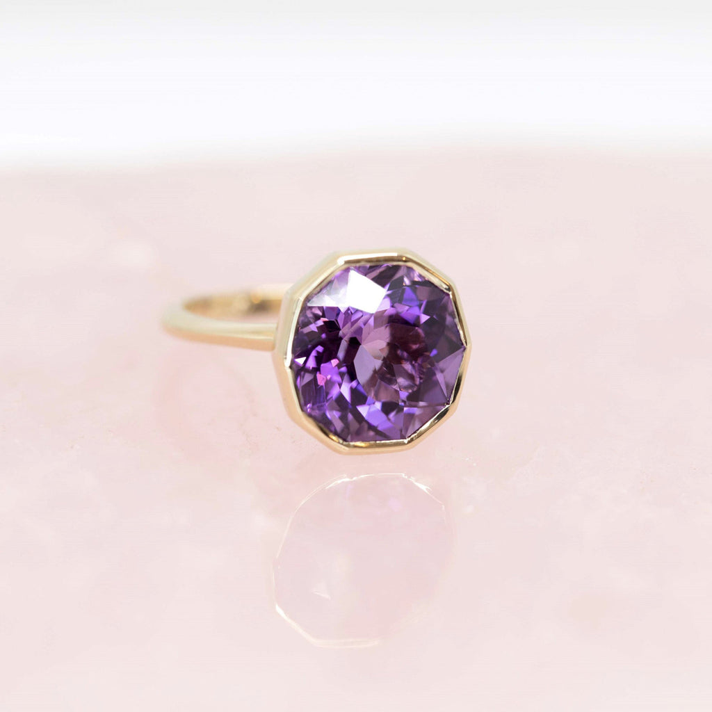 unique jewelry montreal designer ring whit a big fancy shape purple yellow gold ring by bena jewelry designer canada