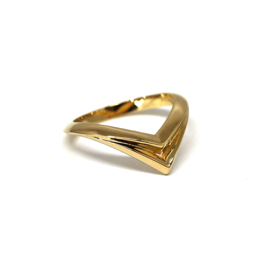 side view of edgy unisex gold bena jewelry ring made in montreal on a white background