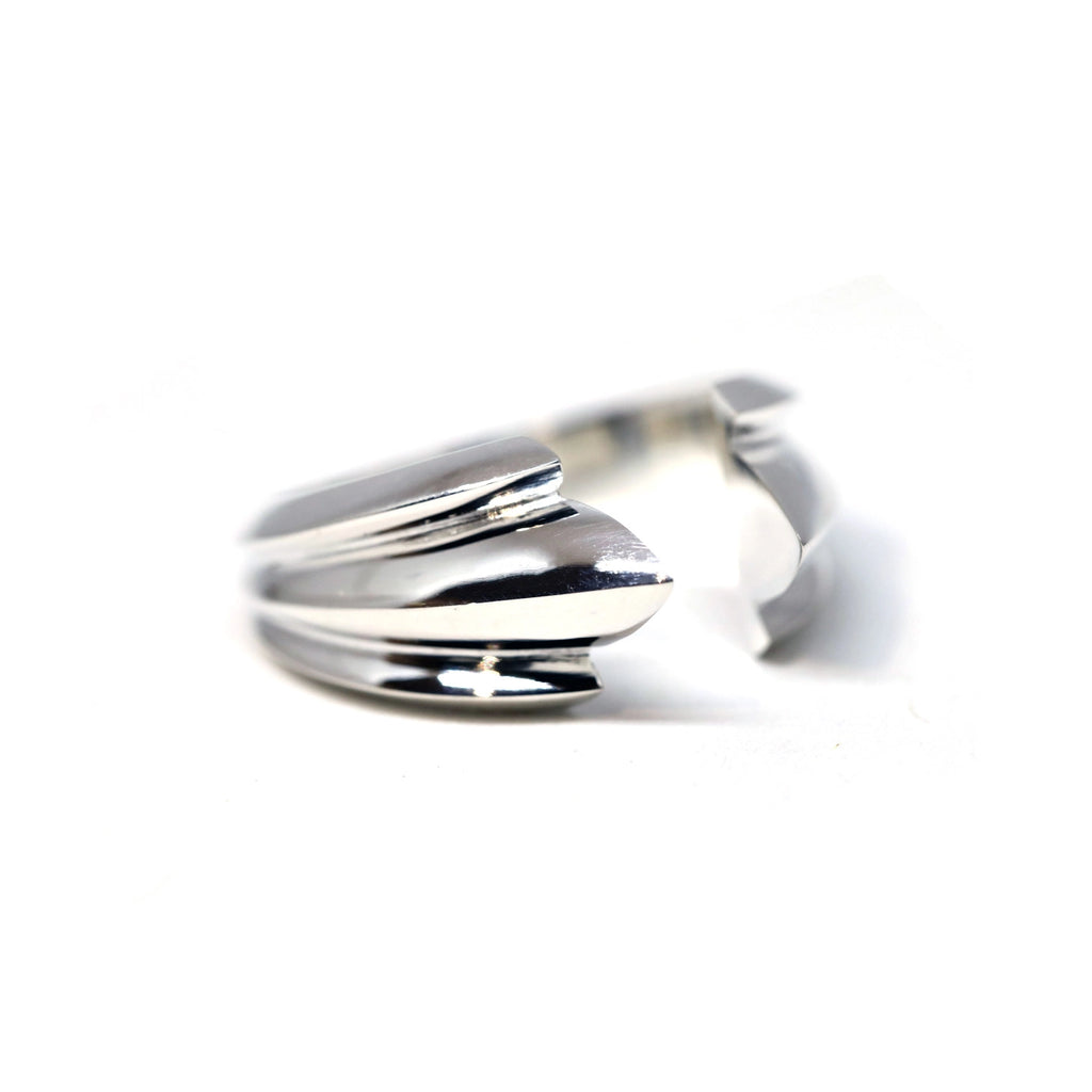 side view of crow edgy silver ring bena jewelry designer montreal at best canadian jewellery gallery boutique ruby mardi modern fine men jewels on a white background