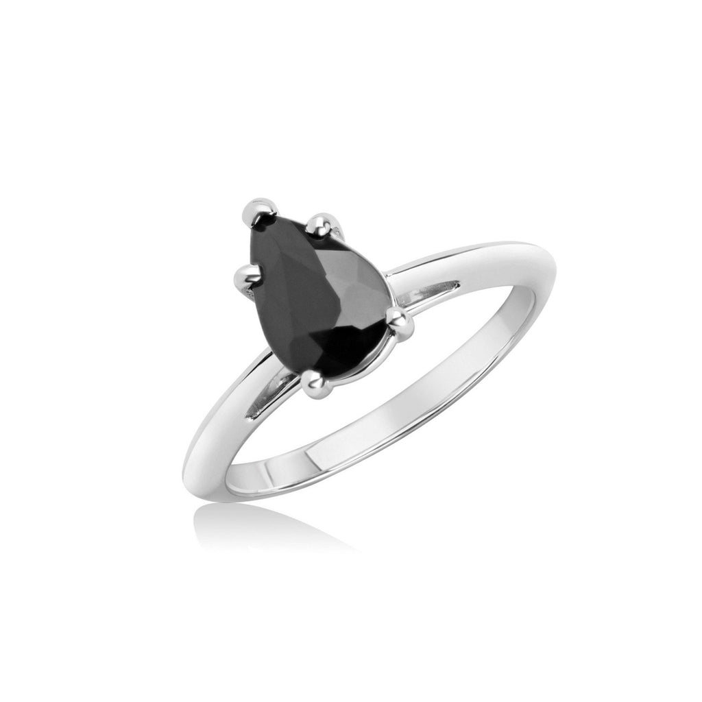 Pear Shape black Spinel Engagement ring on a white background by Ruby Mardi, a fine jewelry gallery in Montreal Little Italy, close by Bijouterie Italienne, and Rosemont, Outremont, Villeray, Parc Extension, Mile End, Mile Ex districts. White gold gemstone ring, bridal jewelry, wedding ring, ethical gem. Ruby Mardi offers custom jewelry services in Montreal. Lab grown diamonds, natural diamonds, Canadian diamonds, ethical diamonds, ethical gemstones.