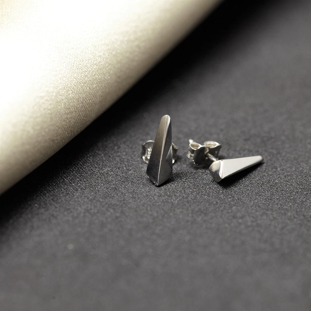 silver edgy blade earrings made in montreal at ruby mardi jeweler unisex minimalist jewellery design