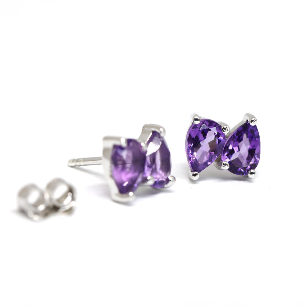 Ruby Mardi offers lovely simple gemstone stud earrings that shine and add a pop of colour to your ear.   Here, beautiful double pear cut amethyst set in silver.  We carefully select the gemstones so they are all of the highest quality. We prioritize traceable and natural gems. Ruby Mardi also offers custom jewelry services in Montreal.